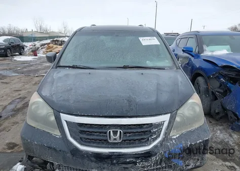 2009 Honda Odyssey Touring z USA, uszkodzony, nr VIN 5FNRL38969B010632